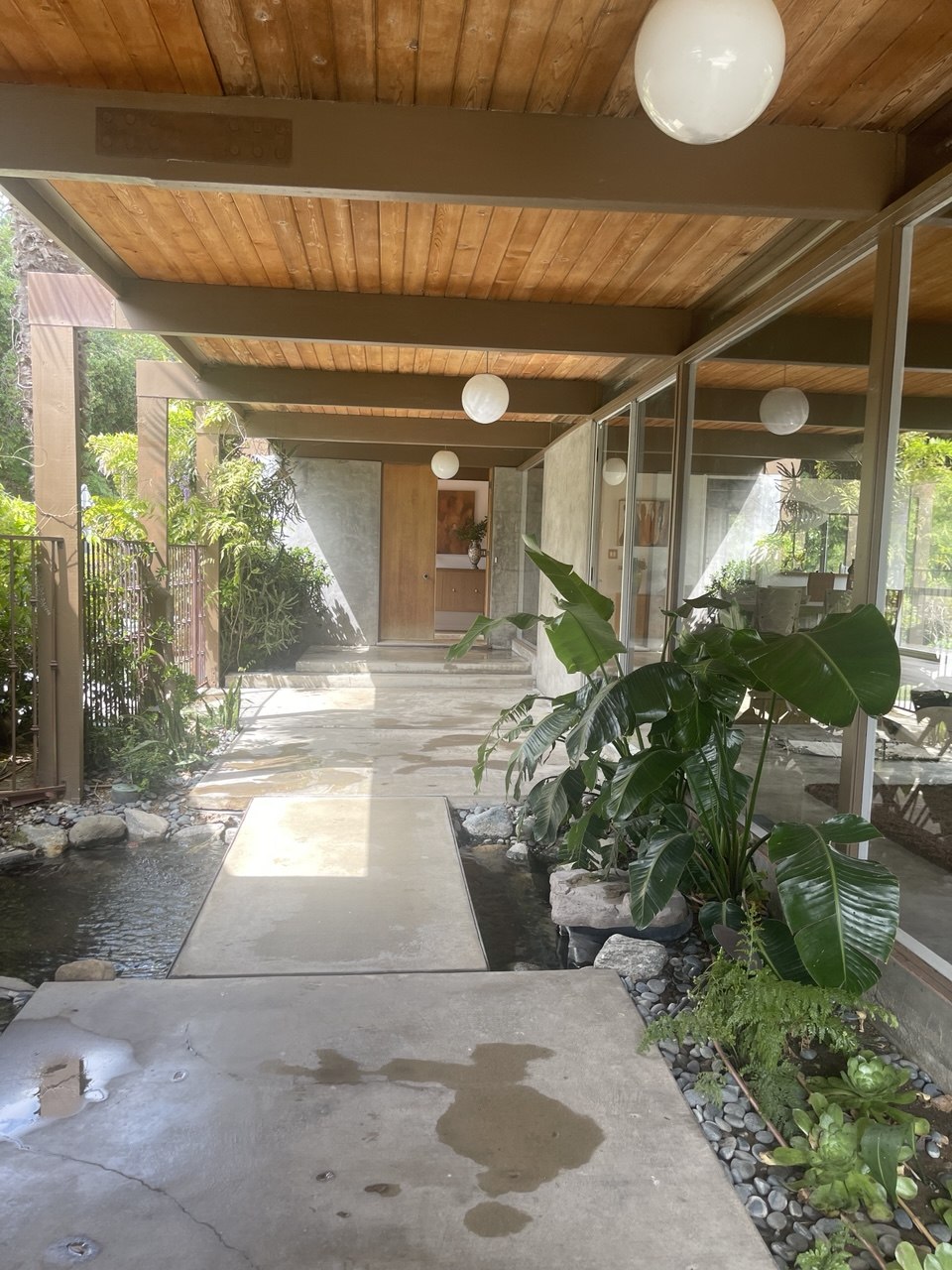 Covered corridor with water feature