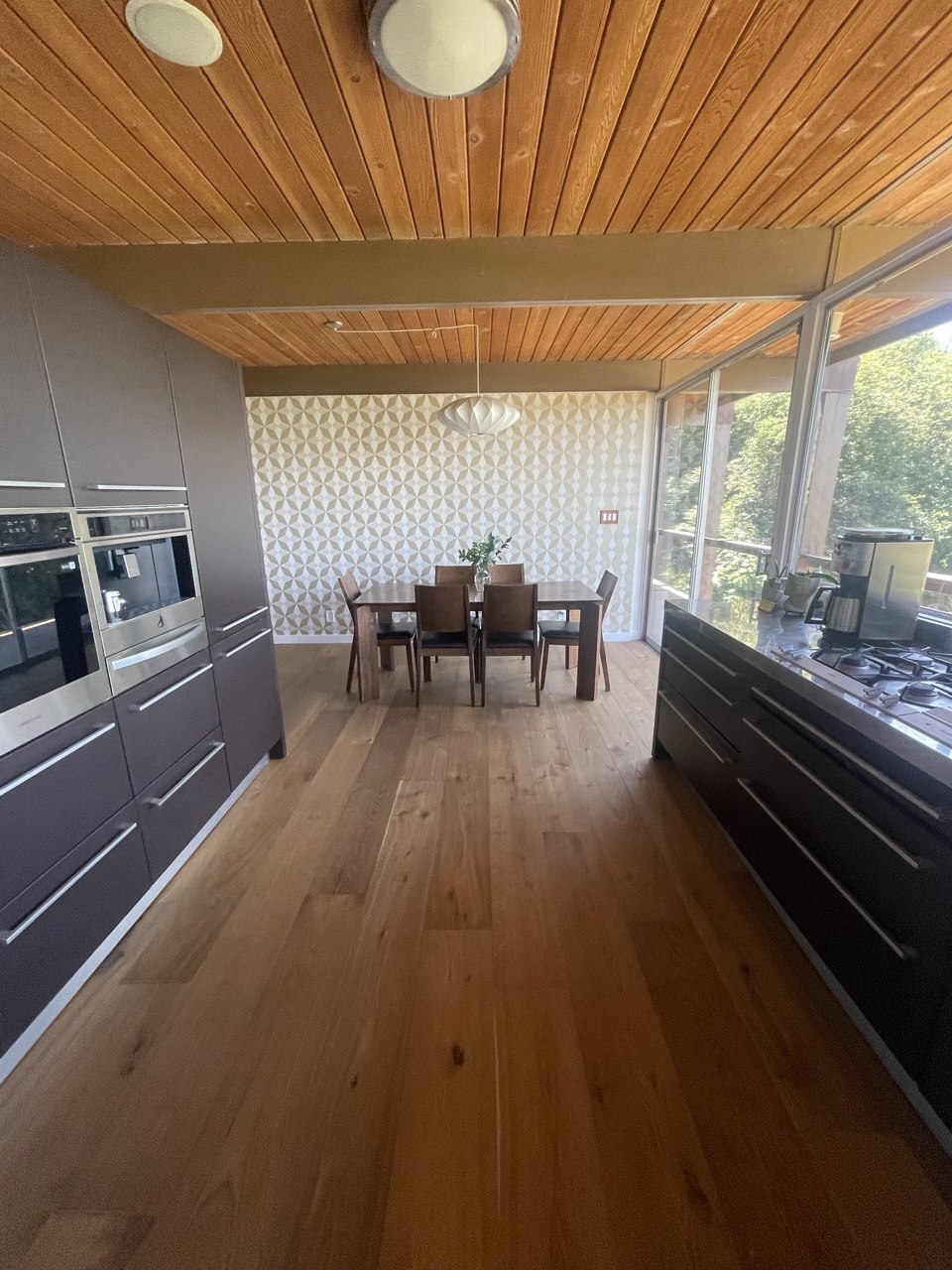 Kitchen and dining area with wood ceilings